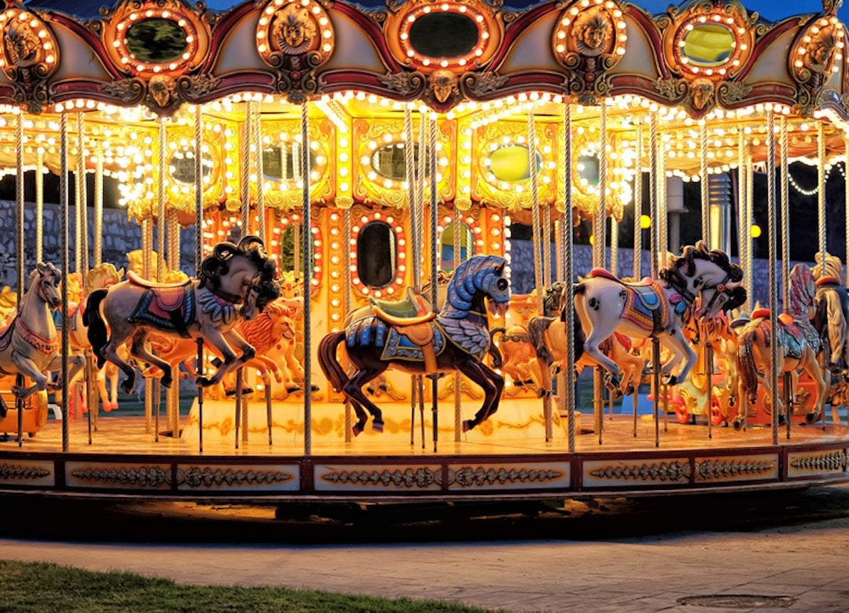 photo of a carousel at night