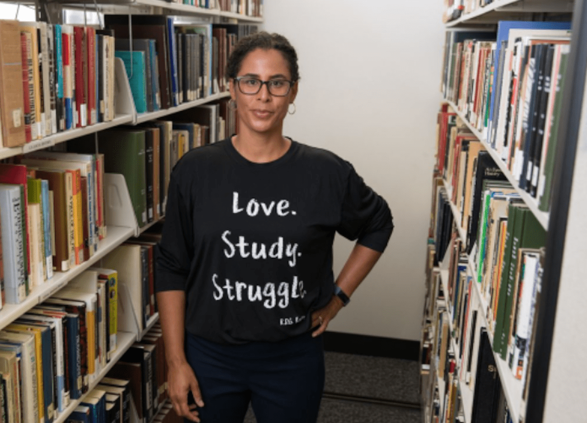 Dr. Kelly Hernandez in the library