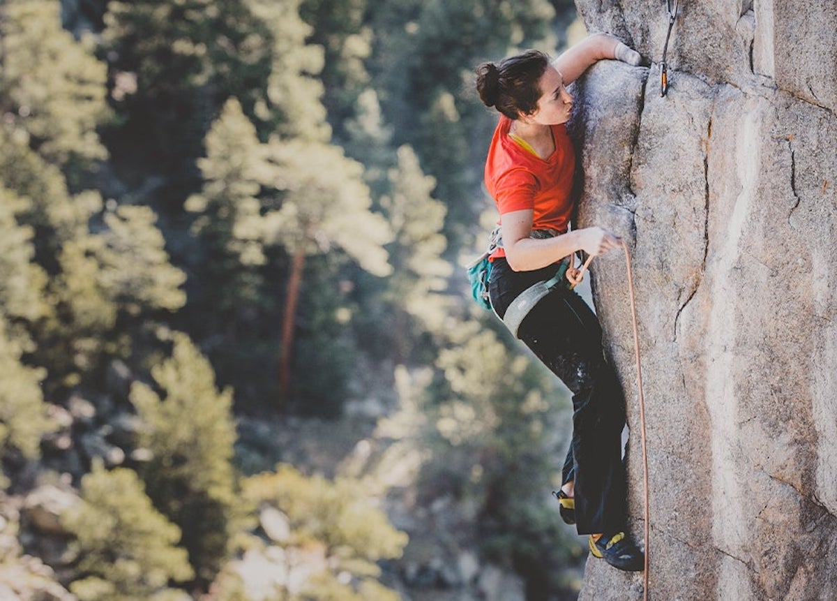 Paraclimber Beck lets nothing stand in her way as she scales a ragged cliff.