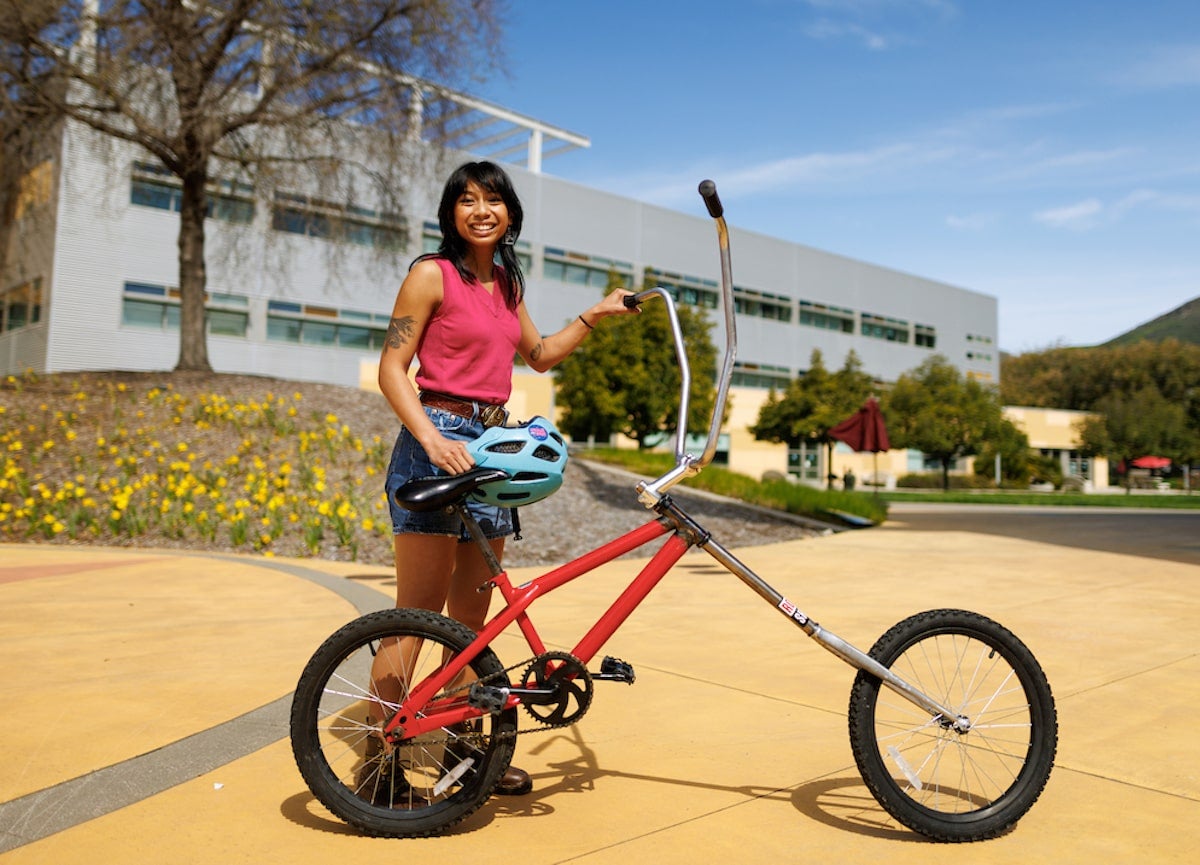 Student in ME 441 - Single Track Vehicle Design class takes part in a bike parade of student project bikes. 