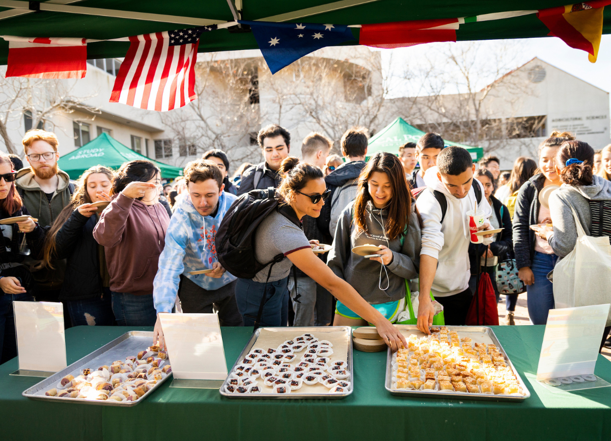 Students sample food from various countries.