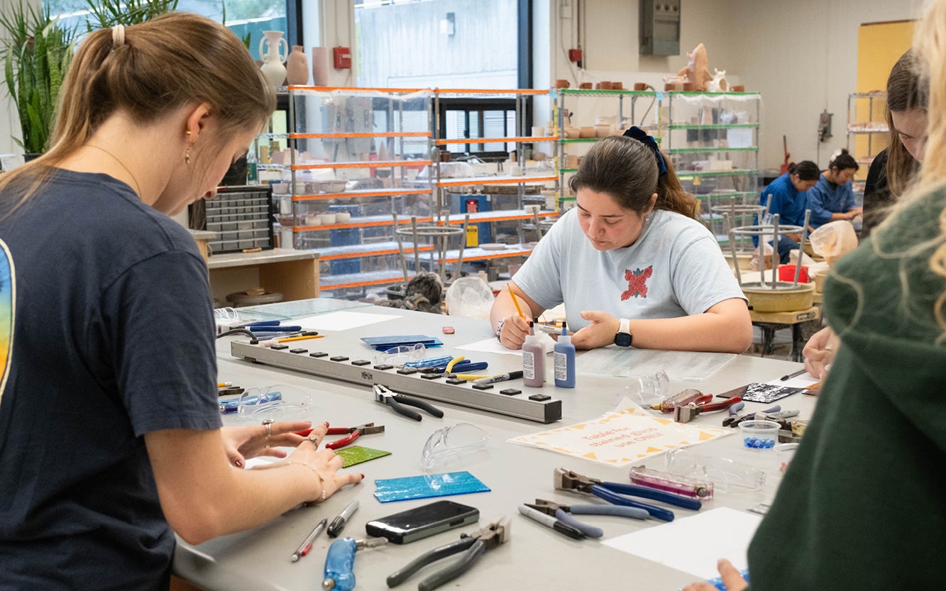 Students working on projects at the ASI Craft Center.