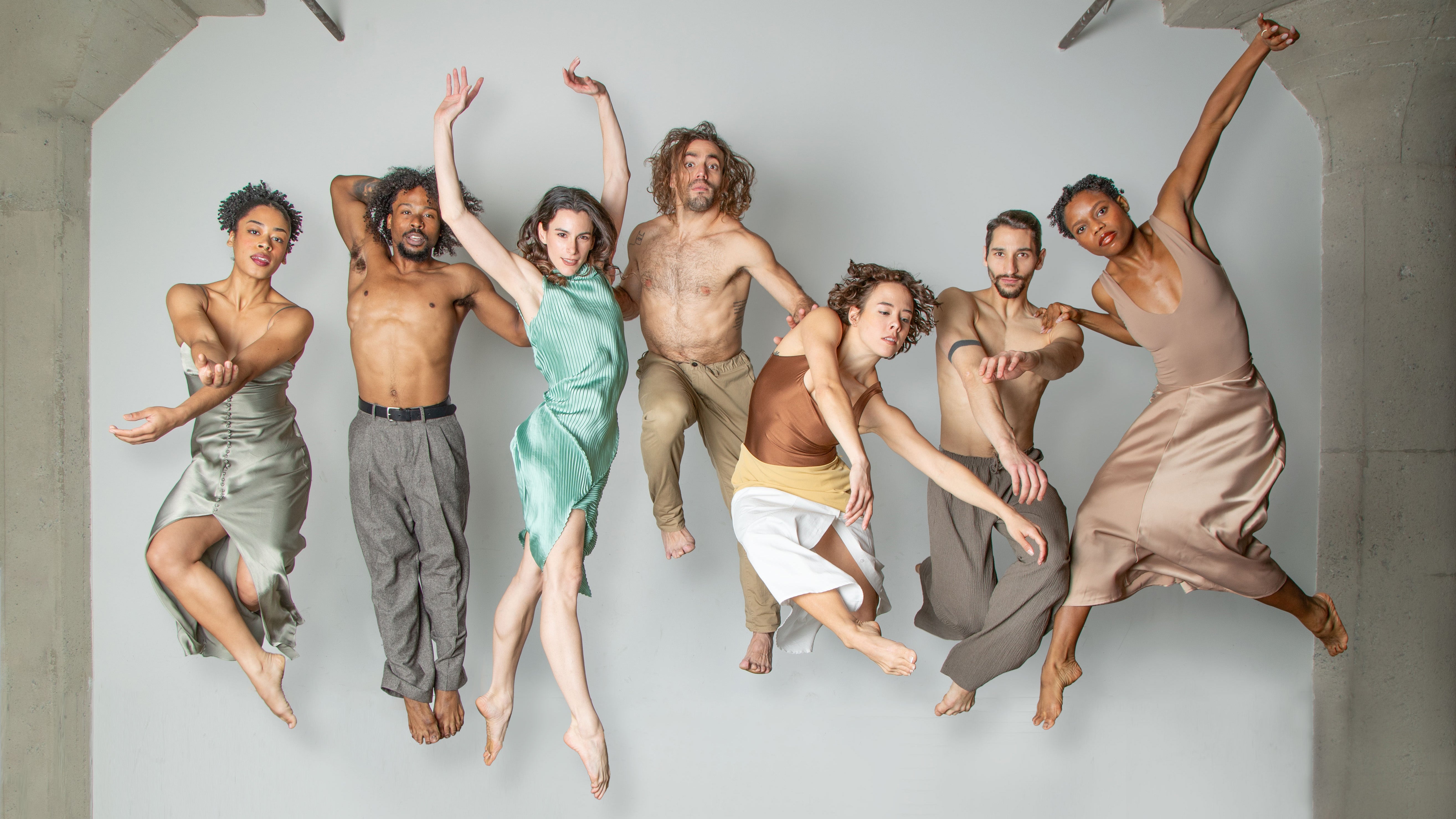 The company of BODYTRAFFIC posing for a publicity photo.