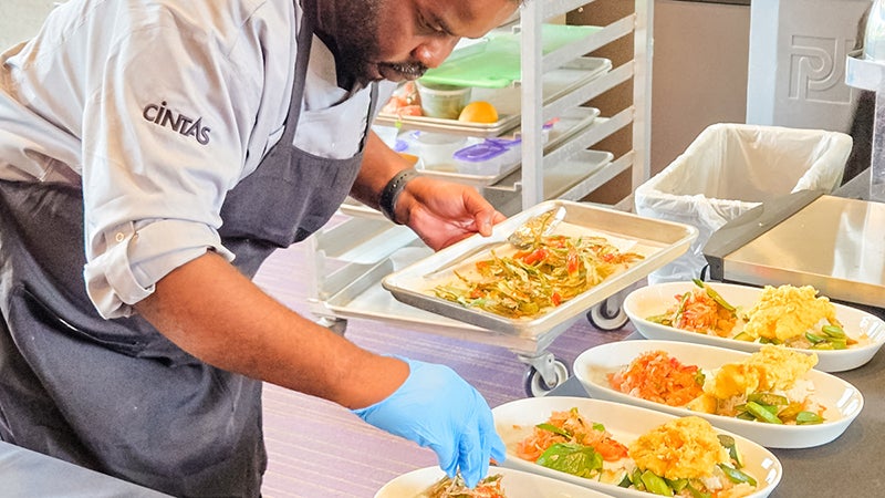 Chef Authur Dulin plating dishes.