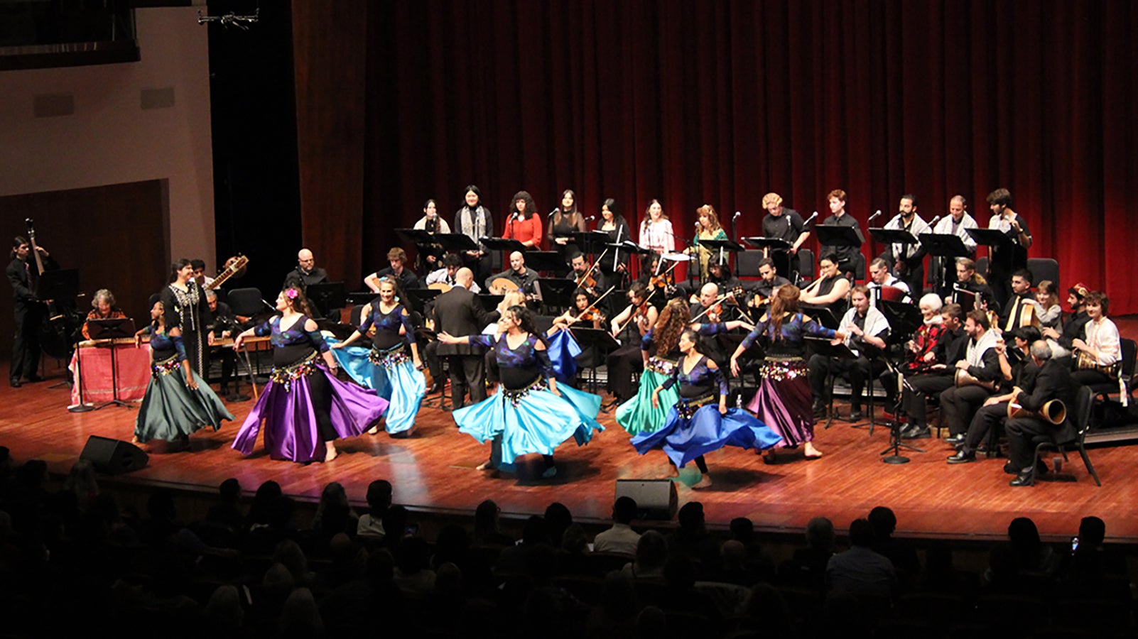 Cal Poly Arab Music Ensemble performing on stage.