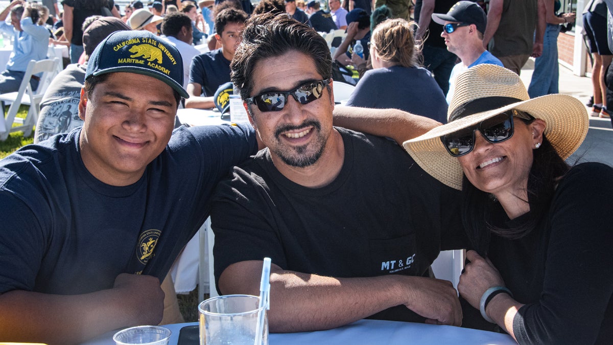 A Cal Poly Maritime student and supporters at move-in day.