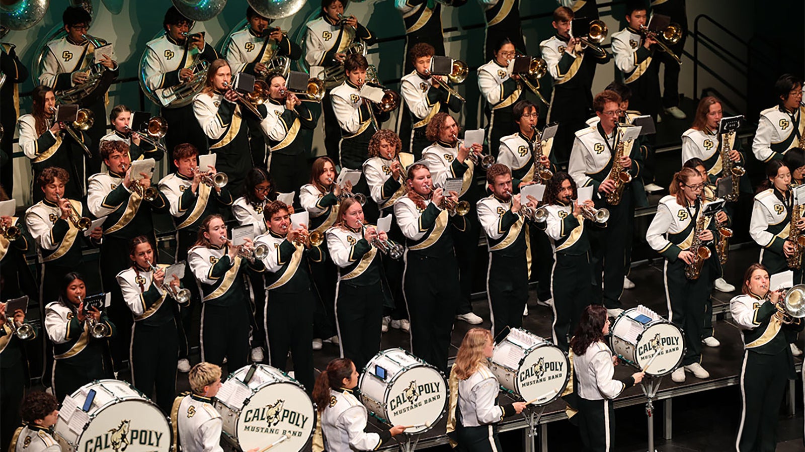 The Cal Poly Marching Band performing on stage.