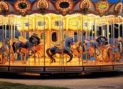 photo of a carousel at night
