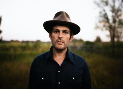Outdoor photo of indie rock/folk music artist, Gregory Alan Isakov