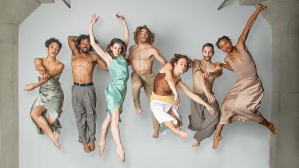 The company of BODYTRAFFIC posing for a publicity photo.