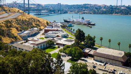 The Cal Poly Maritime Academy campus with Training Ship Golden Bear in the background.