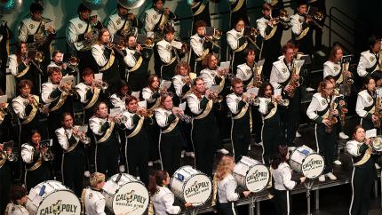 The Cal Poly Marching Band performing on stage.