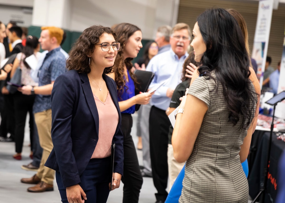 Students and employers network at Cal Poly Career Fairs
