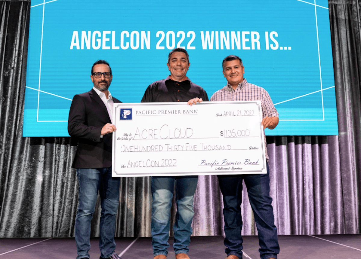 AngelCon 2022 winners hold $100,000 check