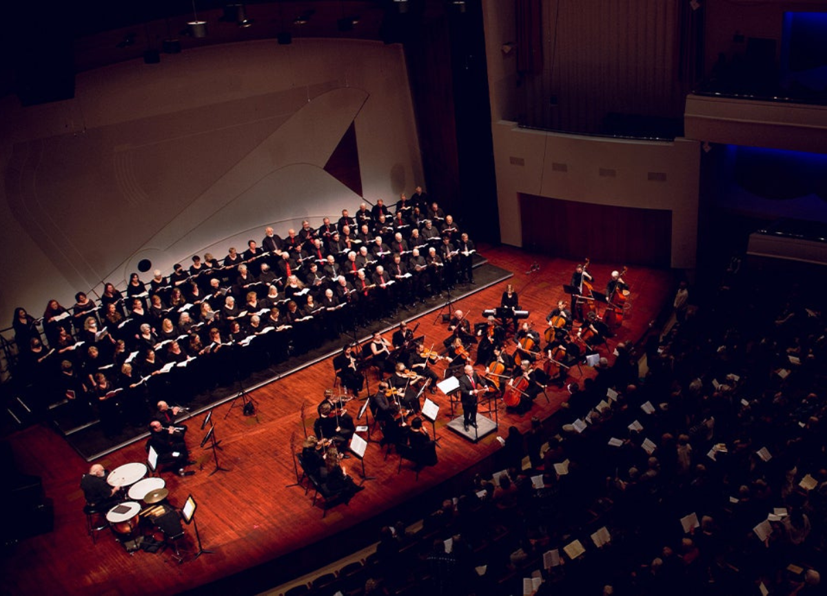 Choir on stage performing.