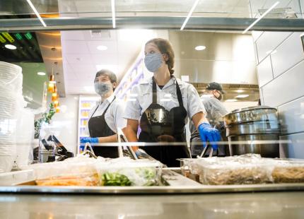 Students preparing food at Campus Dining