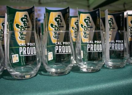 A table displays 4 Cal Poly Proud wine glasses 