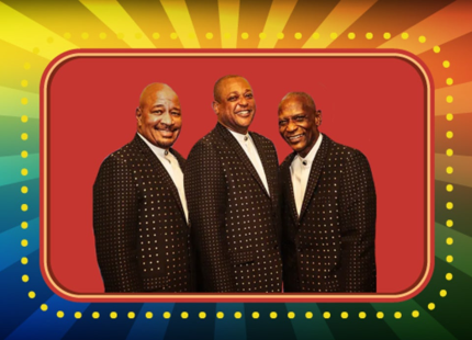 The Stylistics pose amidst a colorful background.